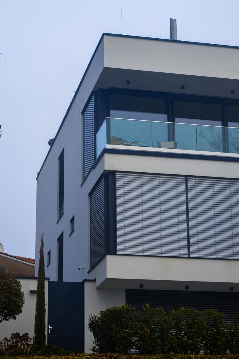 Contemporary home exterior with sleek design and minimalist style.